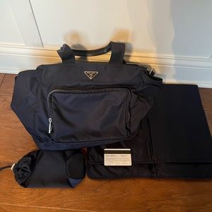 PRADA nylon baby bag. Currently back ordered many places. No discolorations.